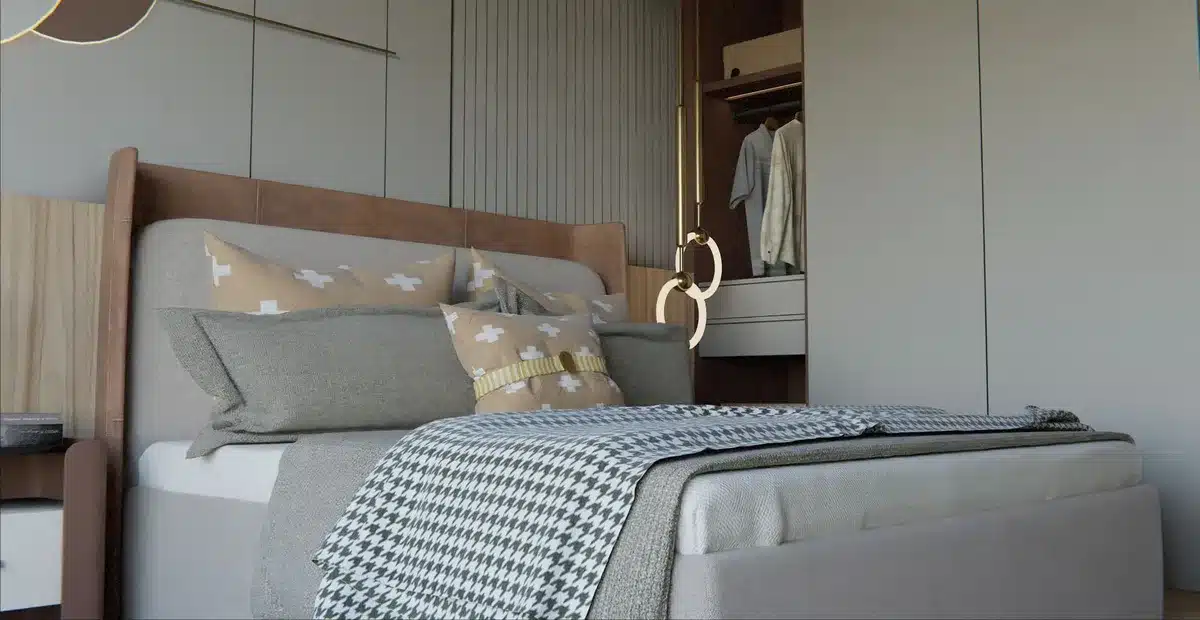 Chambre accueillante avec textiles chauds, lampe douce et ambiance cosy pour l'automne